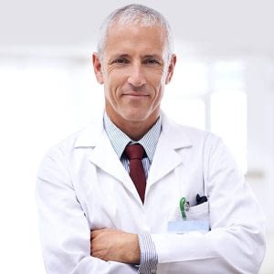Portrait of a confident doctor with folded arms
